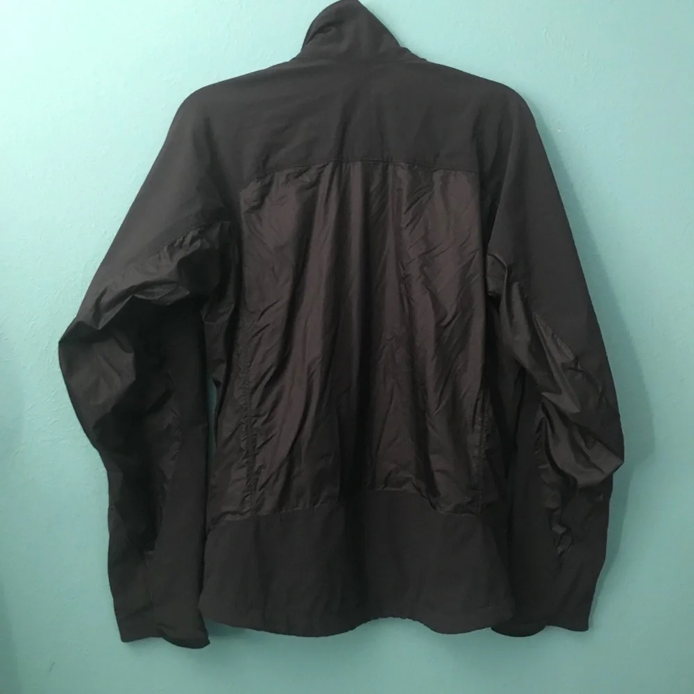 Black REI jacket.
